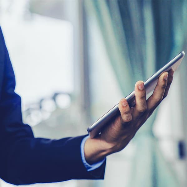 A man holding a tablet